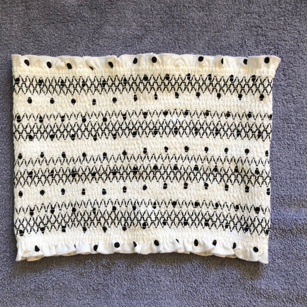 A black and white patterned tube top